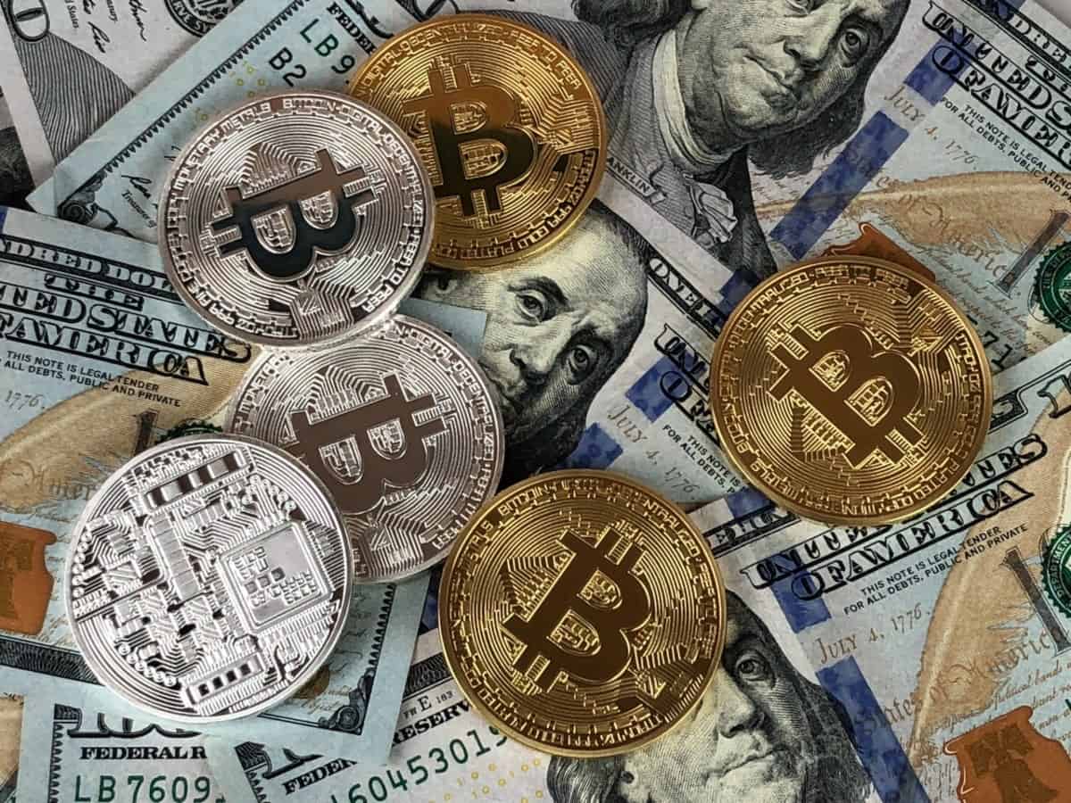 bitcoin and usd dollar bills