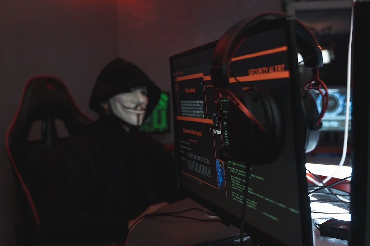 hacker wearing a mask